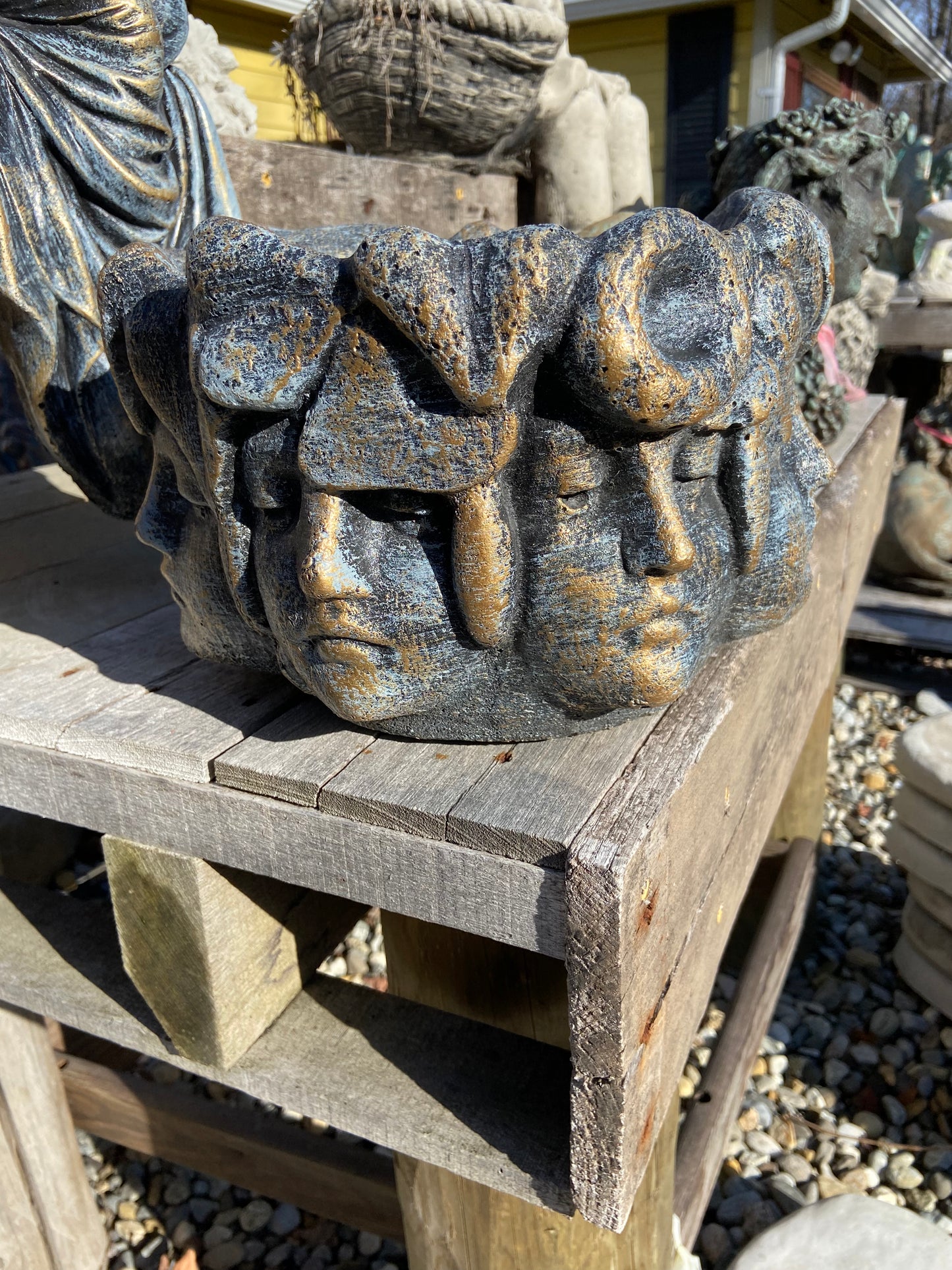 Pot with many Faces