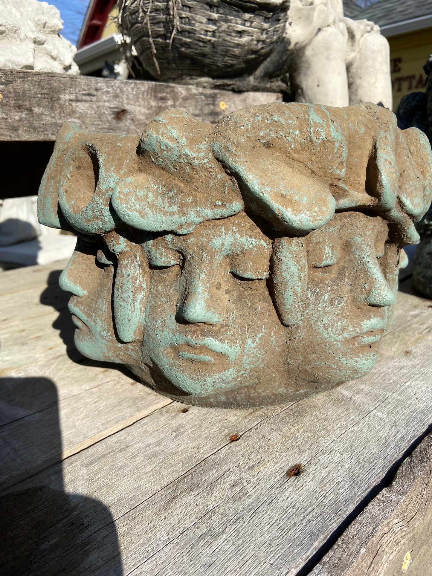 Pot with many Faces
